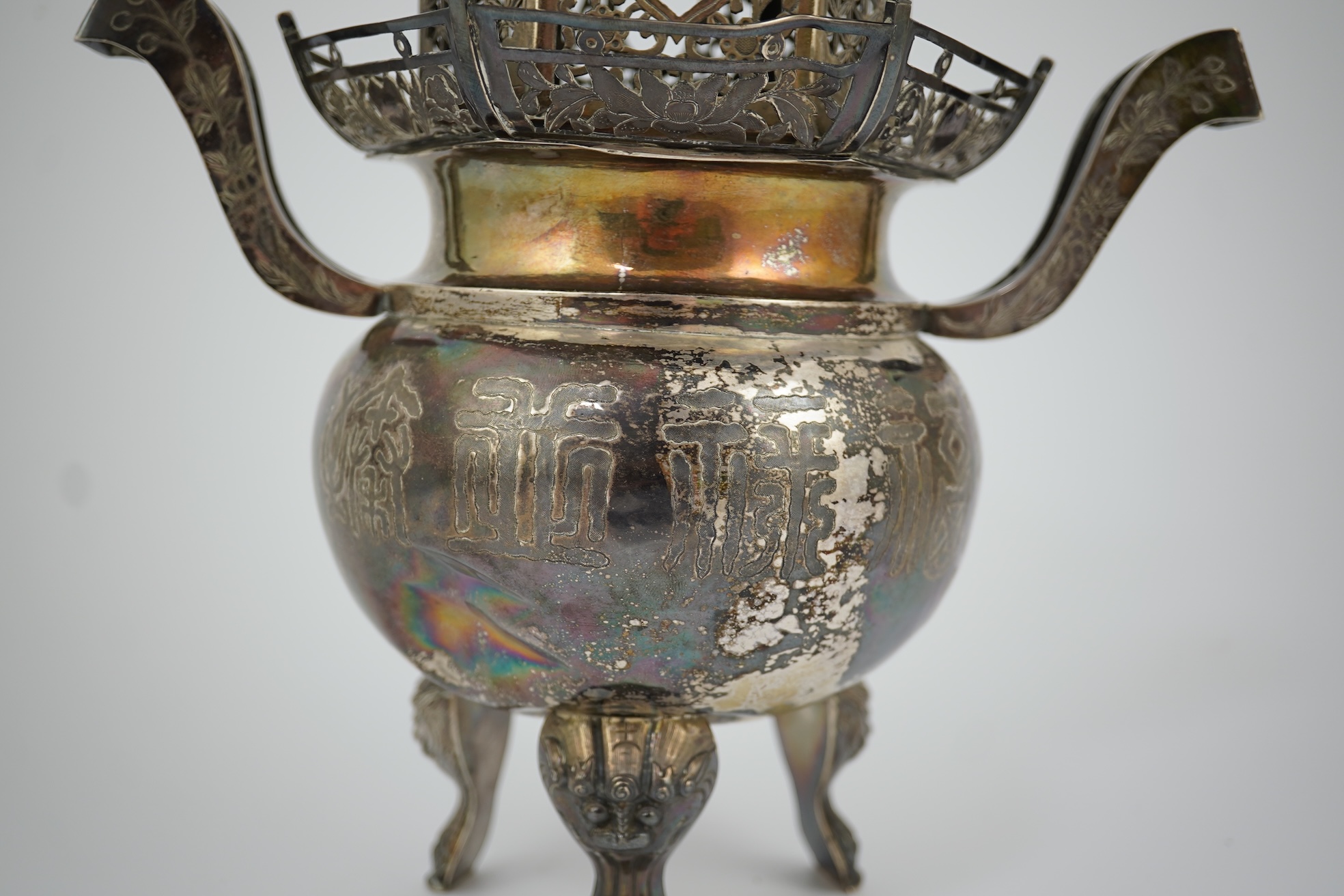 An unusual Chinese silver tripod censer with pagoda shaped cover, ding, early 20th century